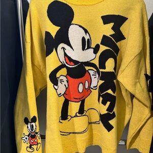Disney Mickey Mouse, black and yellow men’s XL sweater with sleeve hits